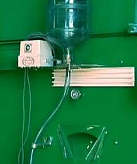 COMET_fertiliser_container-feed_pipe-variable_amount_controller