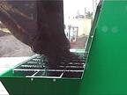 Filling_the_Comet_hopper_with_potting_mix_using